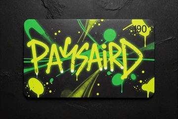 Als Street-Art gemalte Paysafecard-PIN-Karte mit Spray-Paint-Effekt auf Betonwand